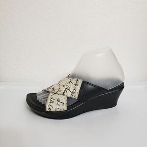Dansko Ava Black Cream Leather Criss Cross Wedge Sandals